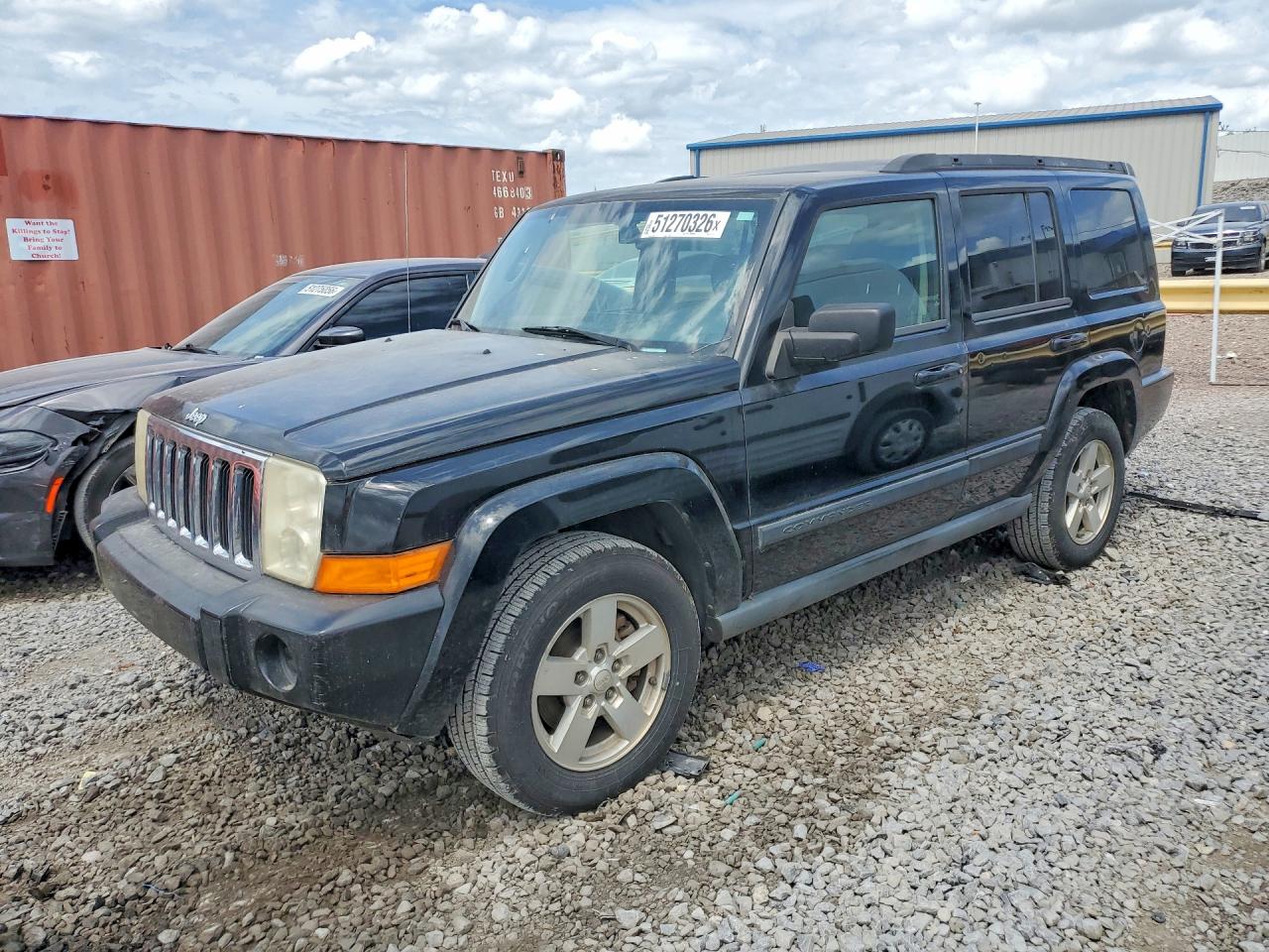 2007 Jeep Commander VIN 1J8HH48KX7C511757 photo 1
