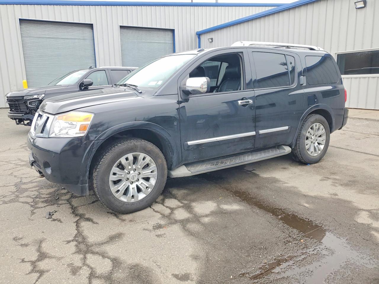 2015 Nissan Armada VIN 5N1AA0NE4FN617074 photo 1