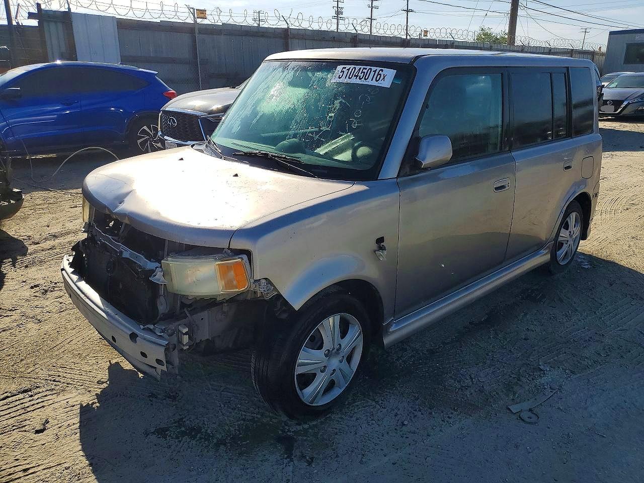 2005 TOYOTA Scion VIN JTLKT324154020117 photo 1