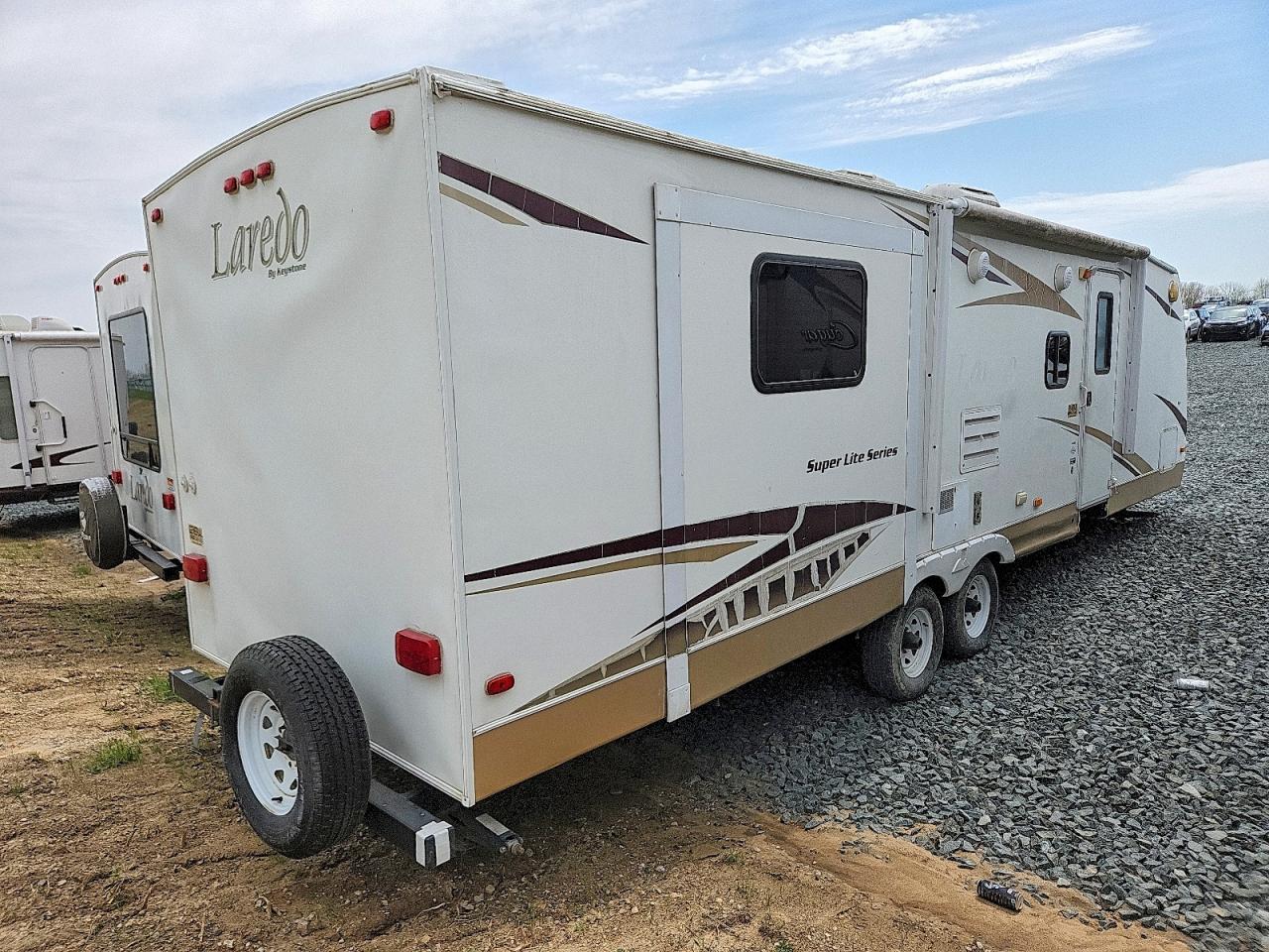 2009 KEYSTONE Laredo ser VIN 4YDT31B2X9L600543 photo 4