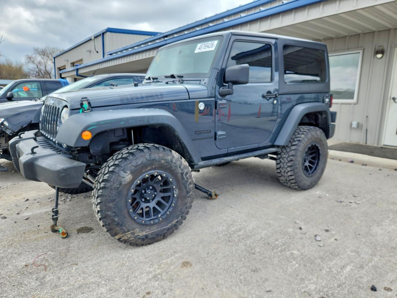 2016 Jeep Wrangler / VIN 1C4AJWAG4GL339210 photo 1