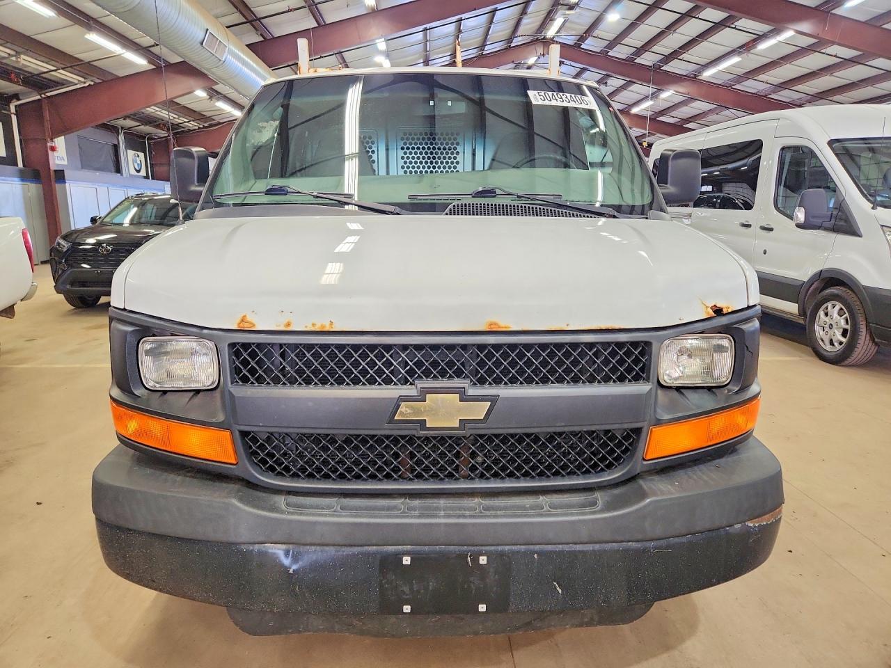 2014 CHEV Express VIN 1GCWGFCA4E1123119 photo 5
