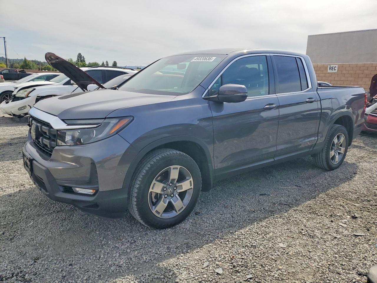 2025 Honda Ridgeline VIN 5FPYK3F50SB036980 photo 1
