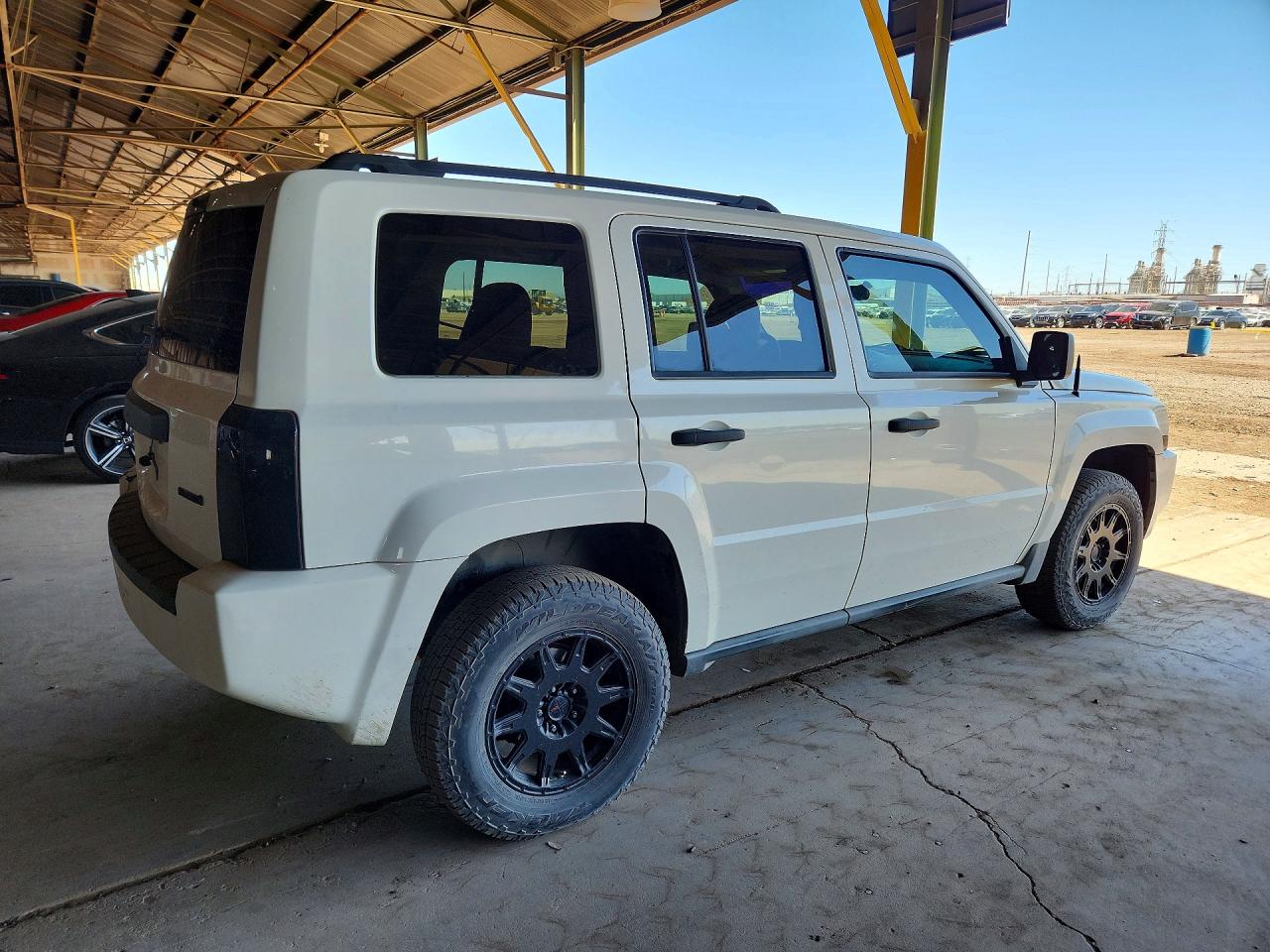 2009 Jeep Patriot VIN 1J4FF28B69D249591 photo 3