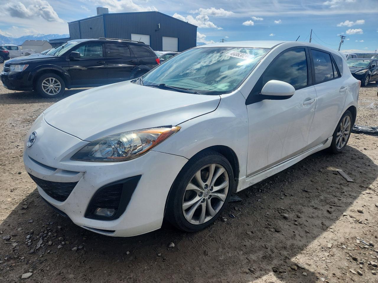 2011 Mazda Mazda3 VIN JM1BL1K64B1409865 photo 1