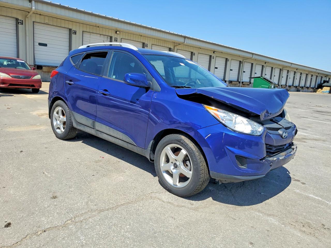 2011 Hyundai Tucson VIN KM8JU3AC0BU129124 photo 4