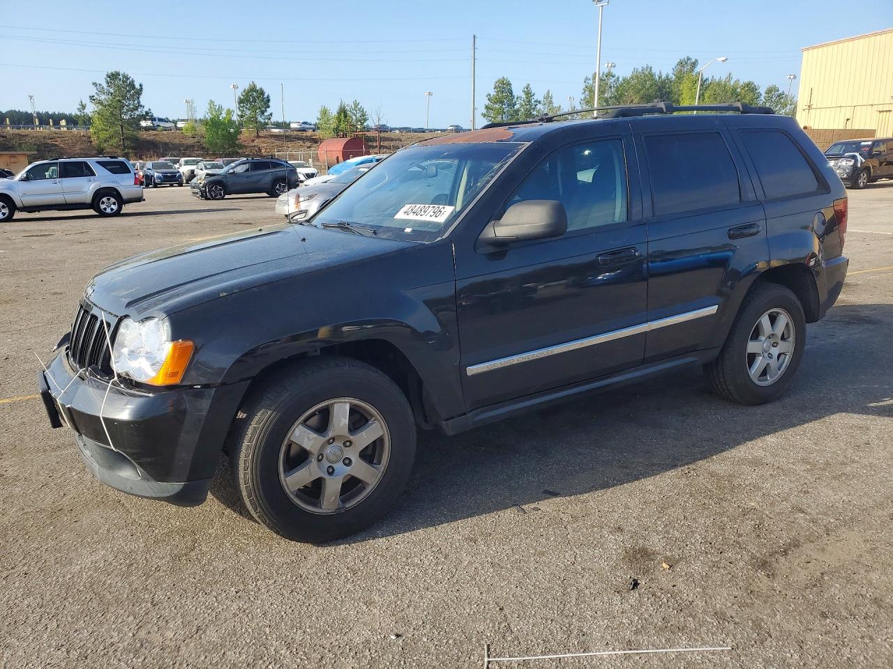 2010 Jeep Cherokee VIN 1J4PS4GKXAC112516 photo 1