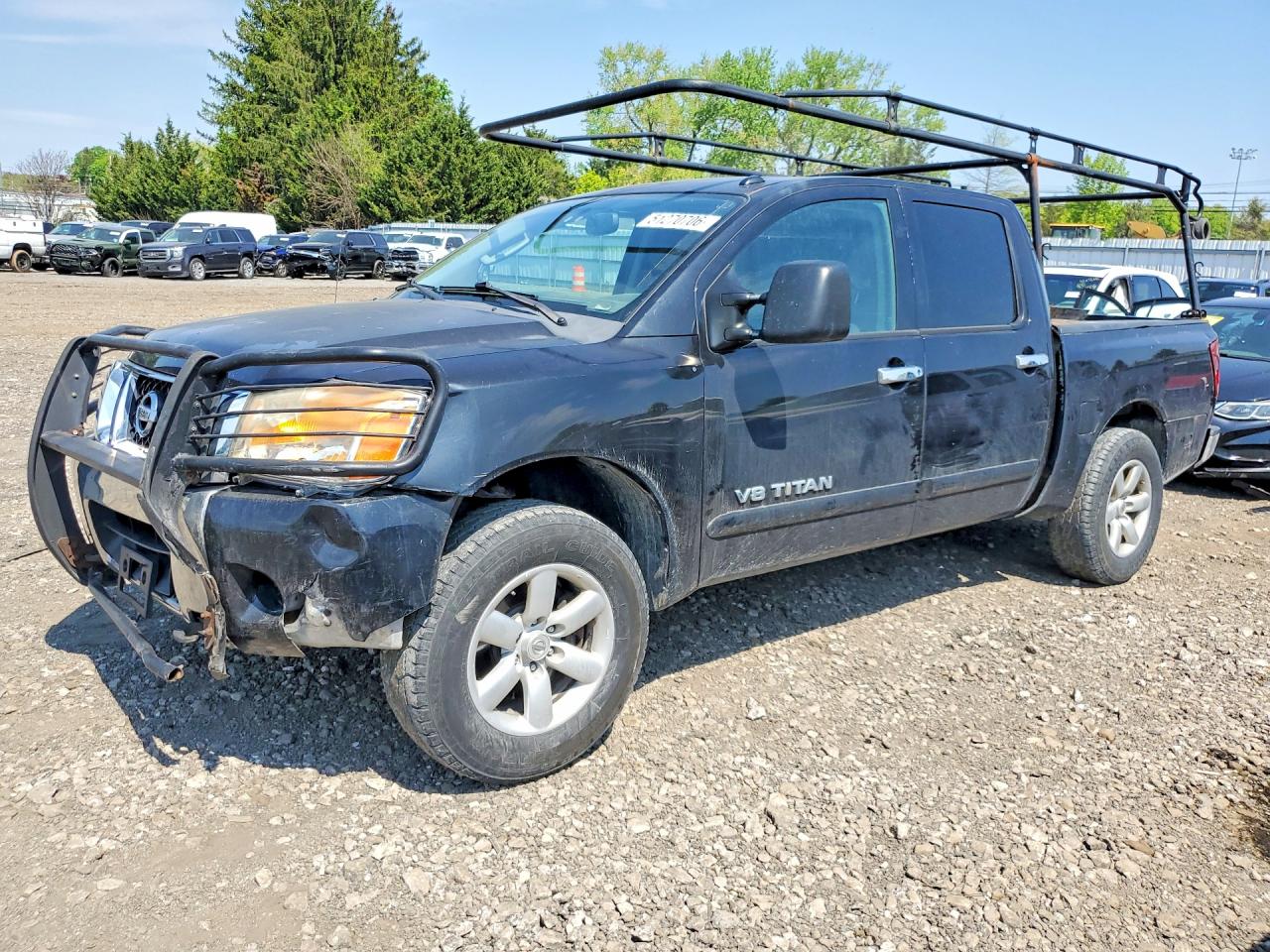 2011 Nissan TITAN VIN 1N6AA0ECXBN310051 photo 1