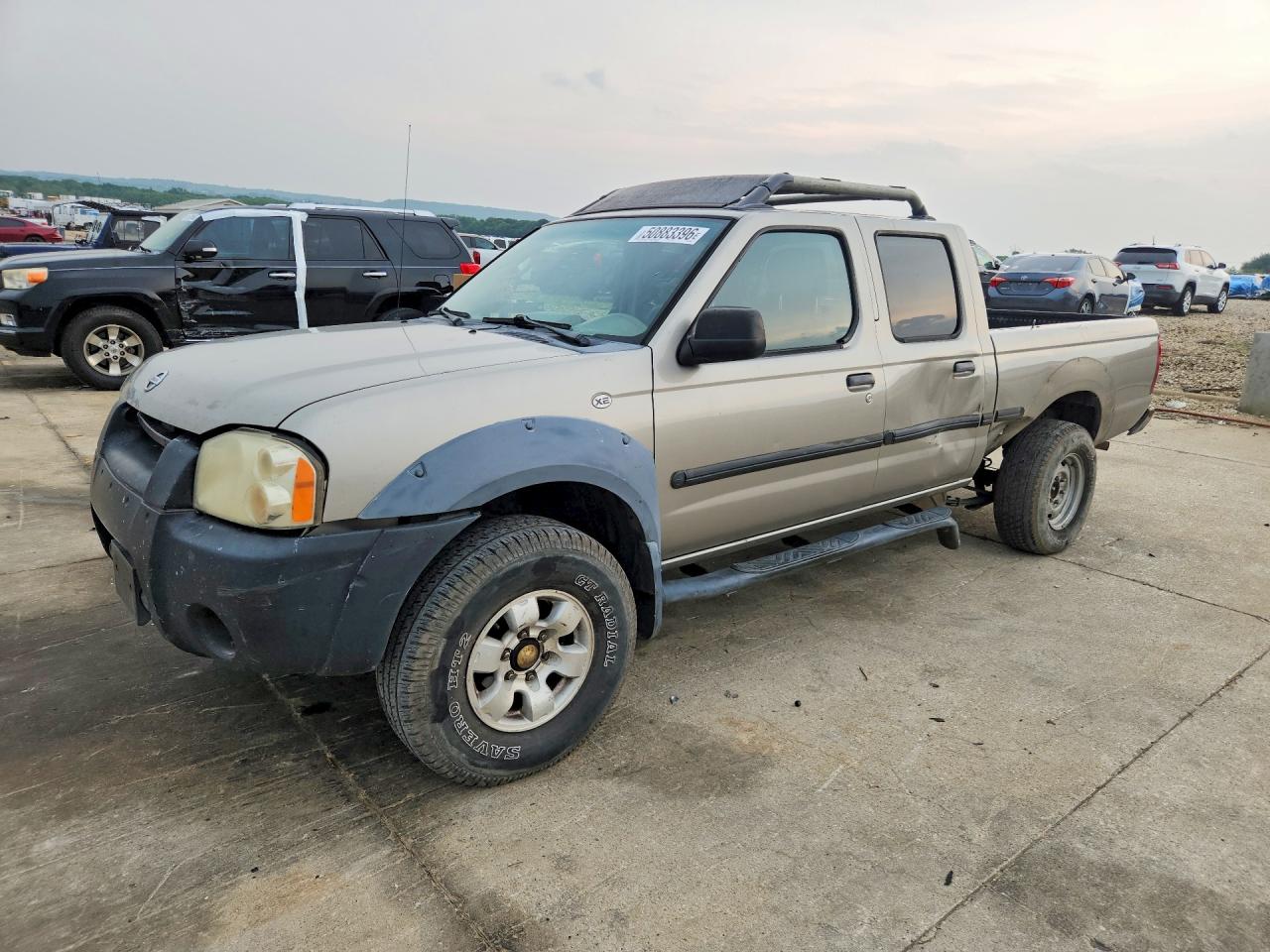 2002 Nissan Frontier VIN 1N6ED29X22C323566 photo 1