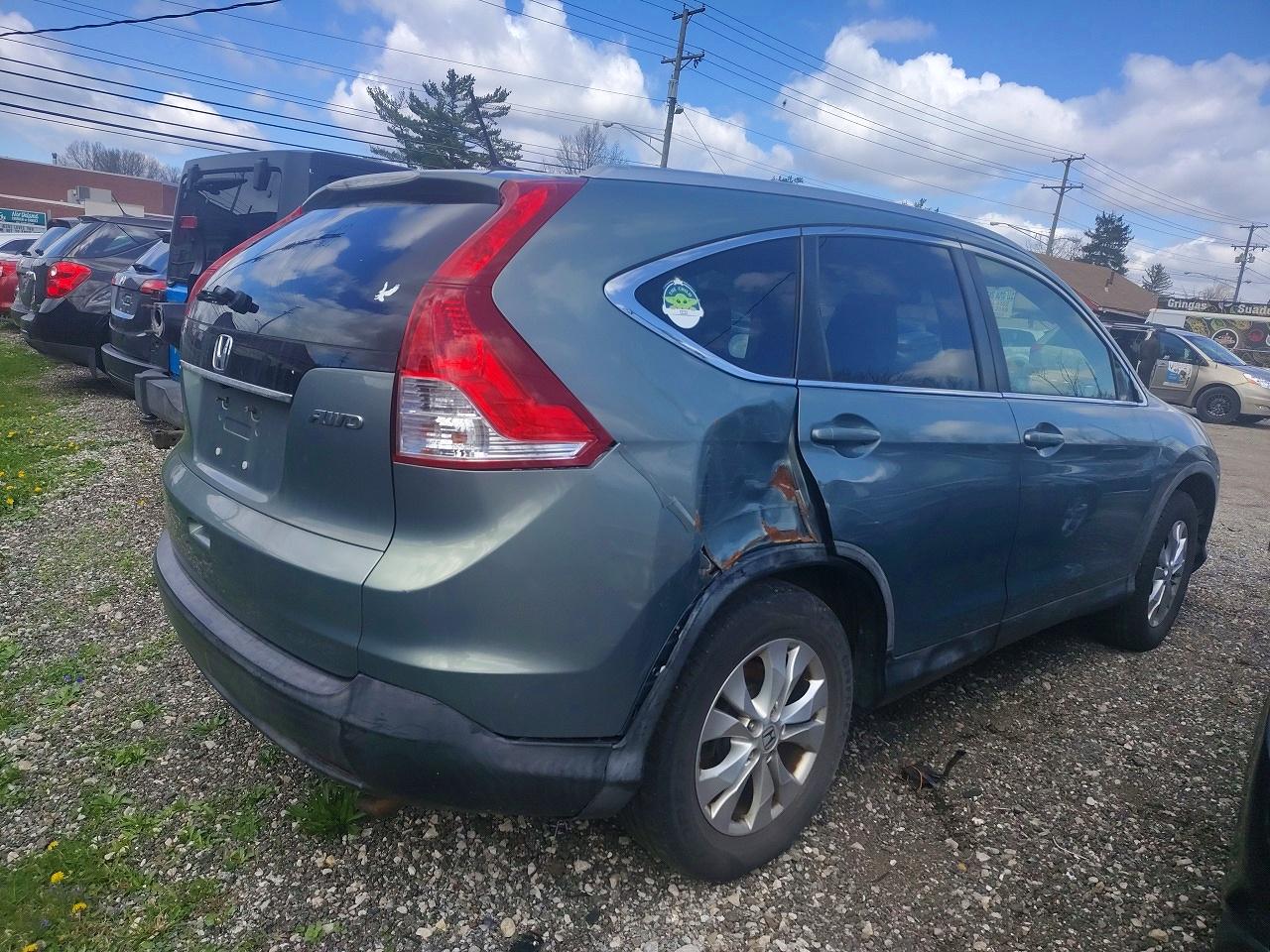 2012 Honda Crv VIN JHLRM4H71CC008554 photo 4