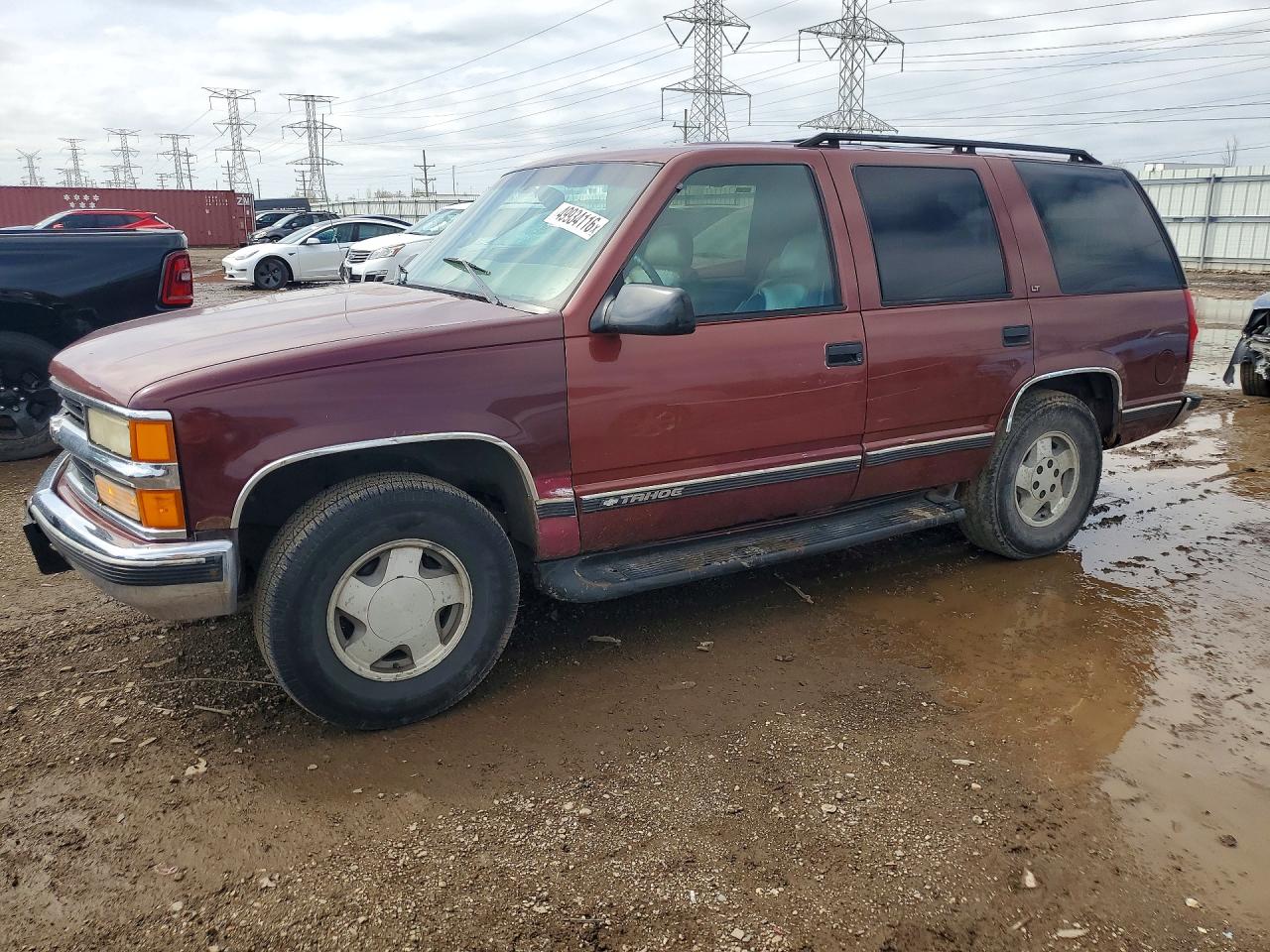 1999 Chevrolet Tahoe VIN 1GNEK13R9XJ341702 photo 1