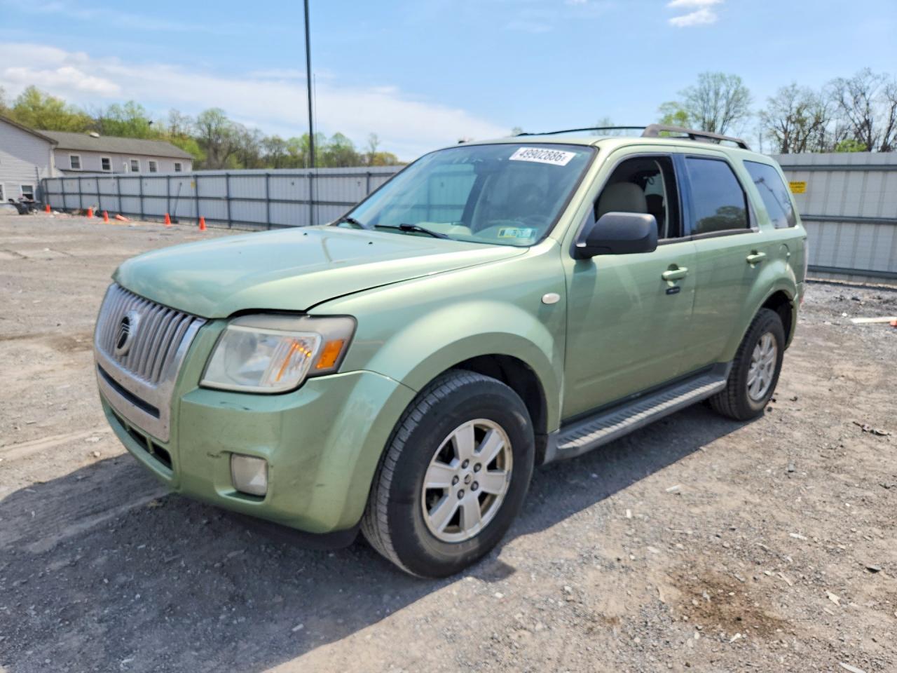 2009 Mercury Mariner VIN 4M2CU81799KJ03814 photo 1