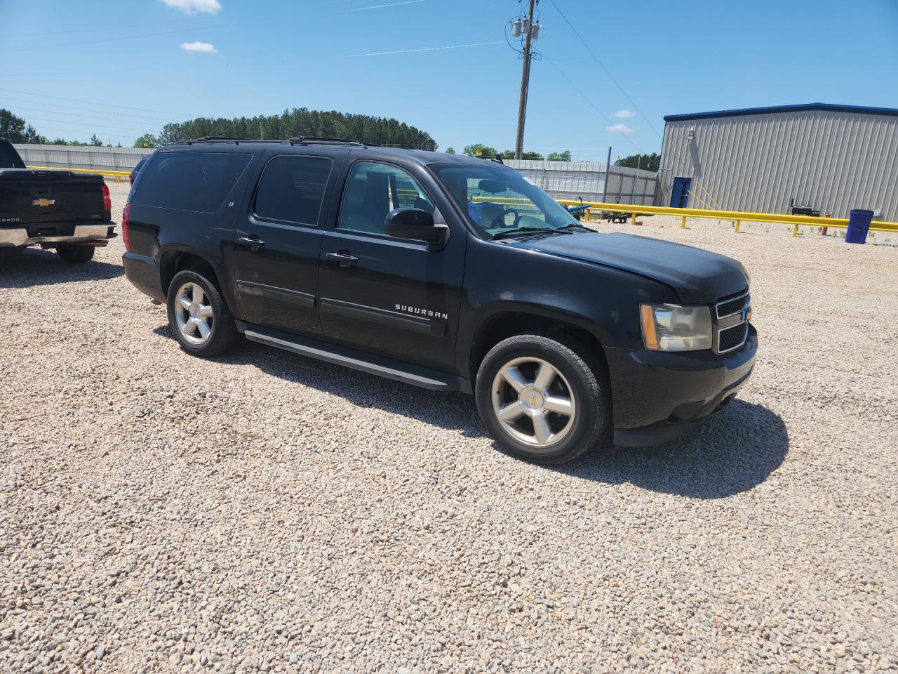 2011 Chevrolet Suburban VIN 1GNSCJE0XBR111112 photo 4