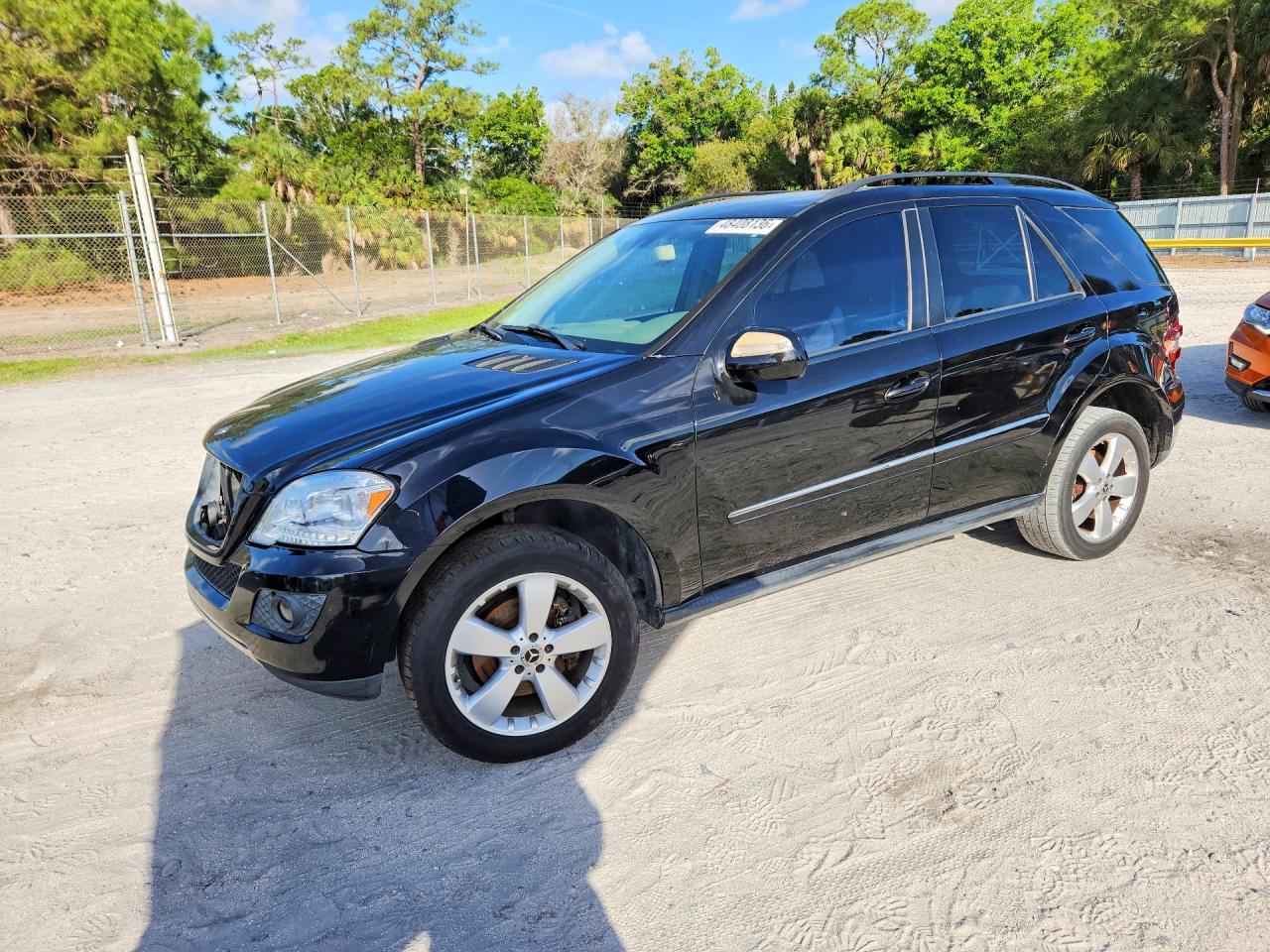 2009 Mercedes-Benz M-class VIN 4JGBB86E29A477066 photo 1
