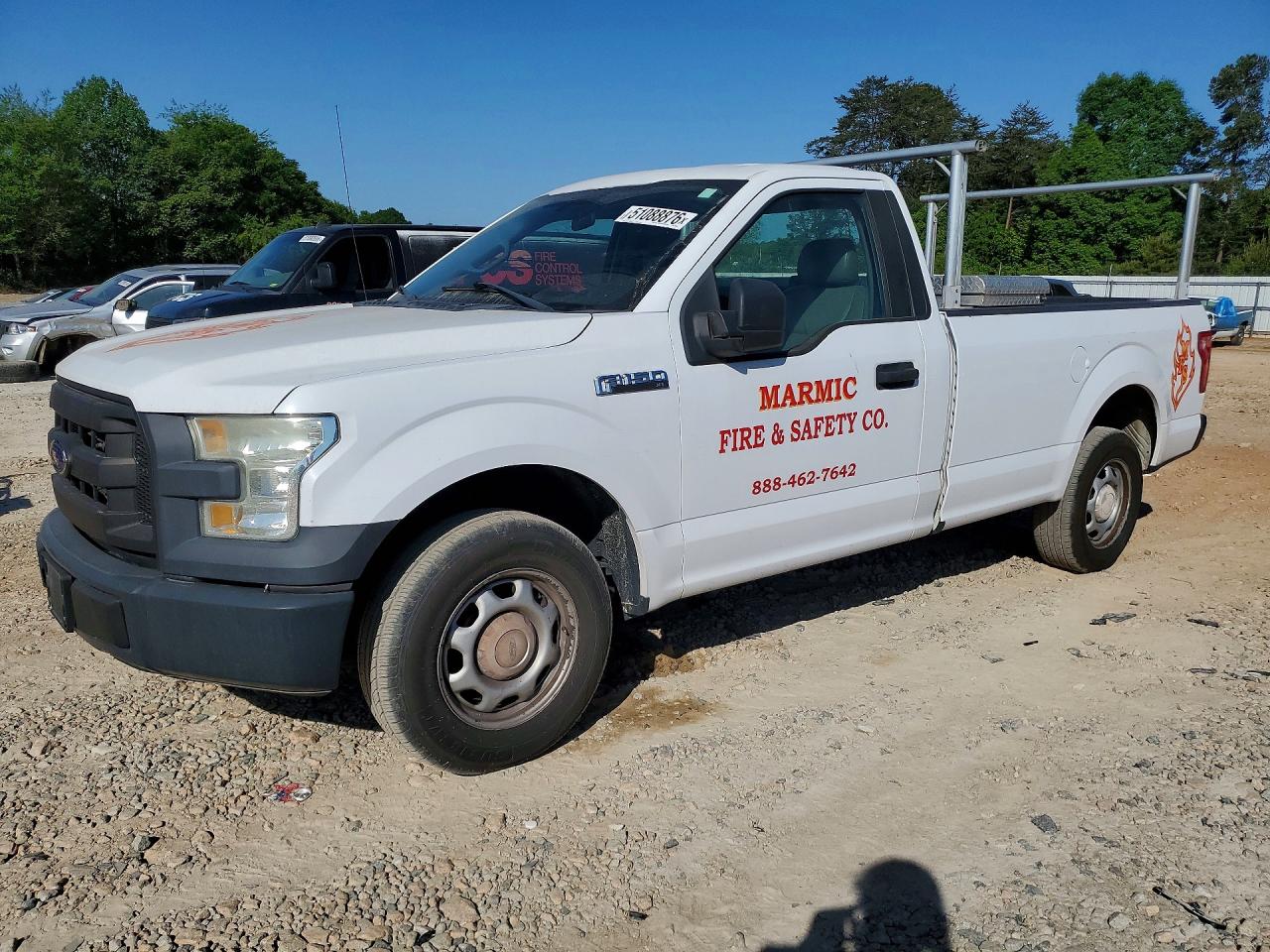 2015 Ford F150 VIN 1FTMF1C88FKD50058 photo 1