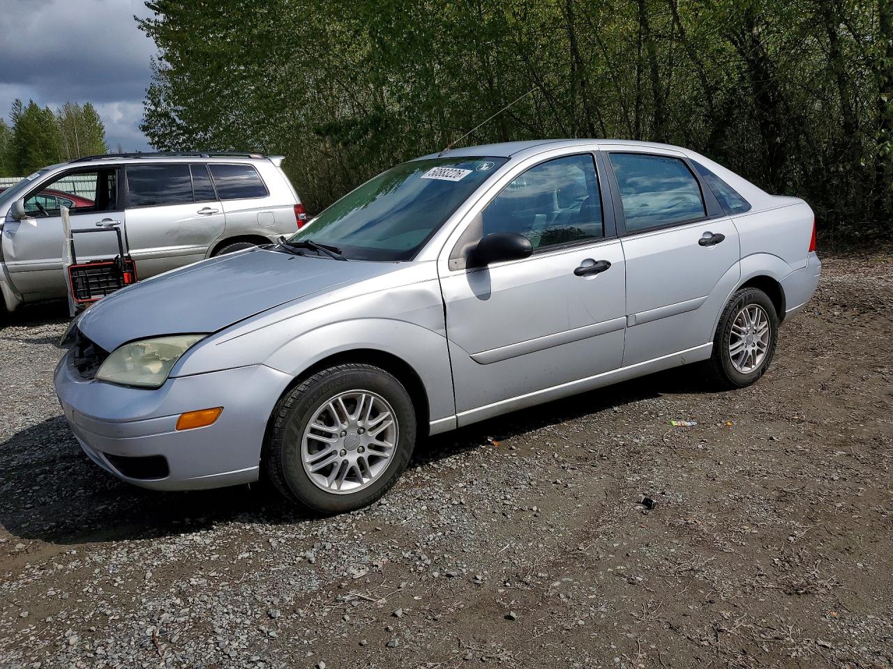 2005 FORD Focus VIN 1FAFP34N15W238270 photo 1