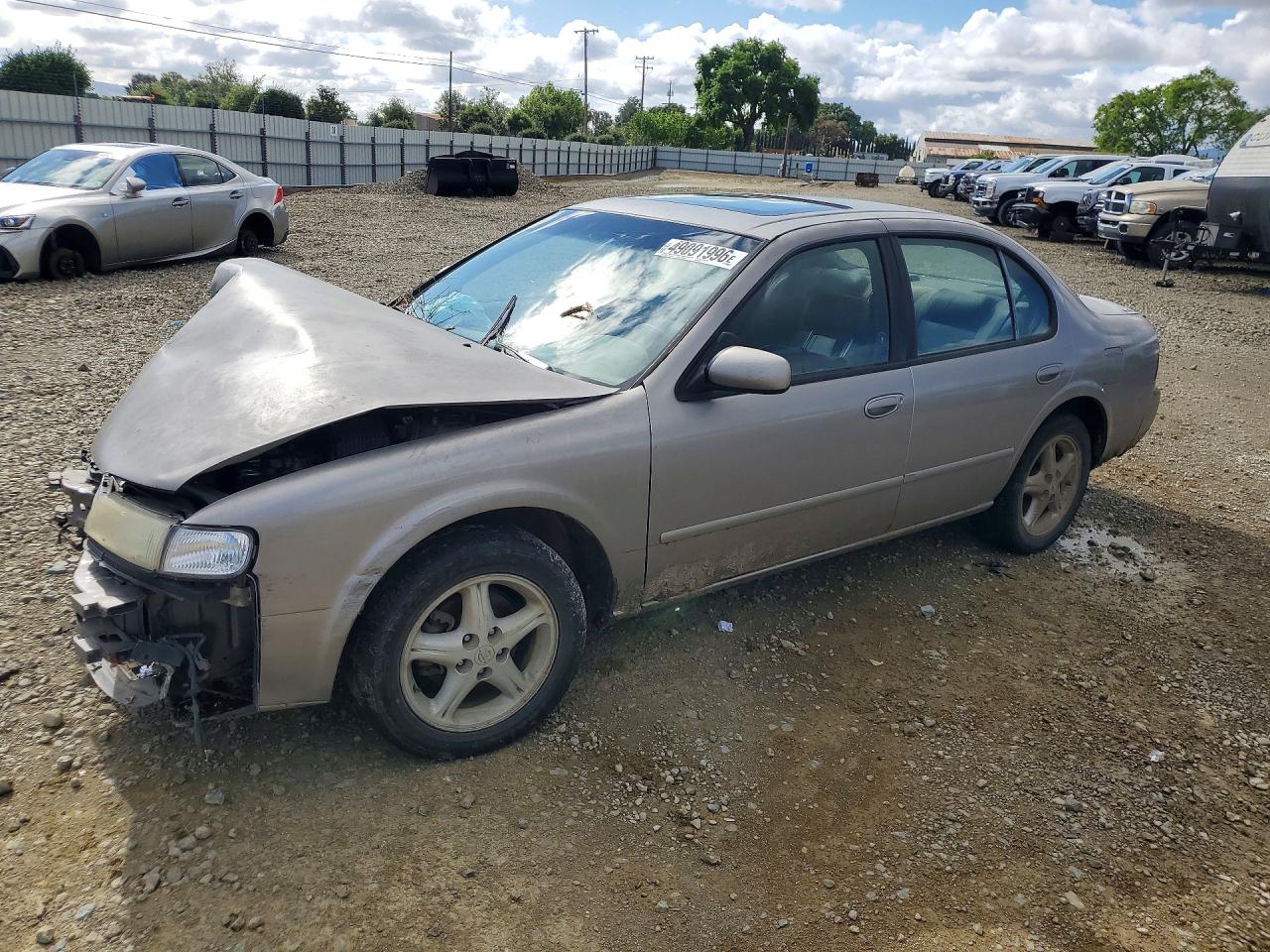 1999 Nissan Maxima VIN JN1CA21A0XT102651 photo 1