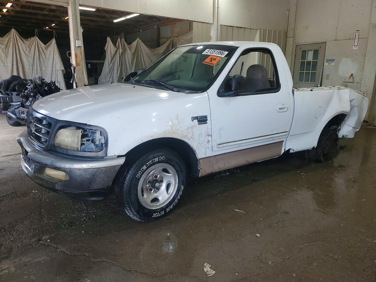 1998 Ford F150 VIN 1FTZF17W8WNB36569 photo 1
