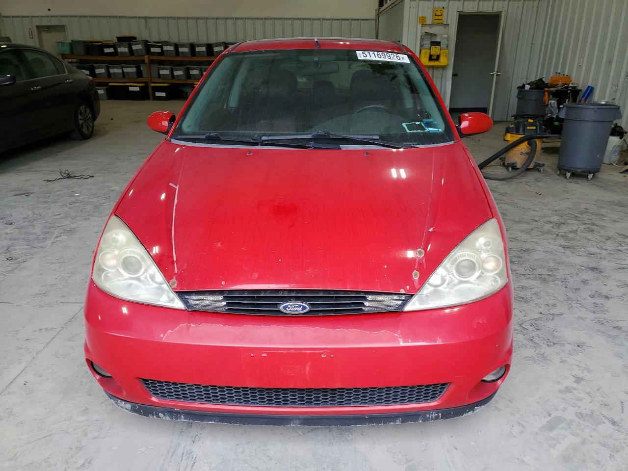 2003 Ford Focus VIN 3FAHP39563R174650 photo 5