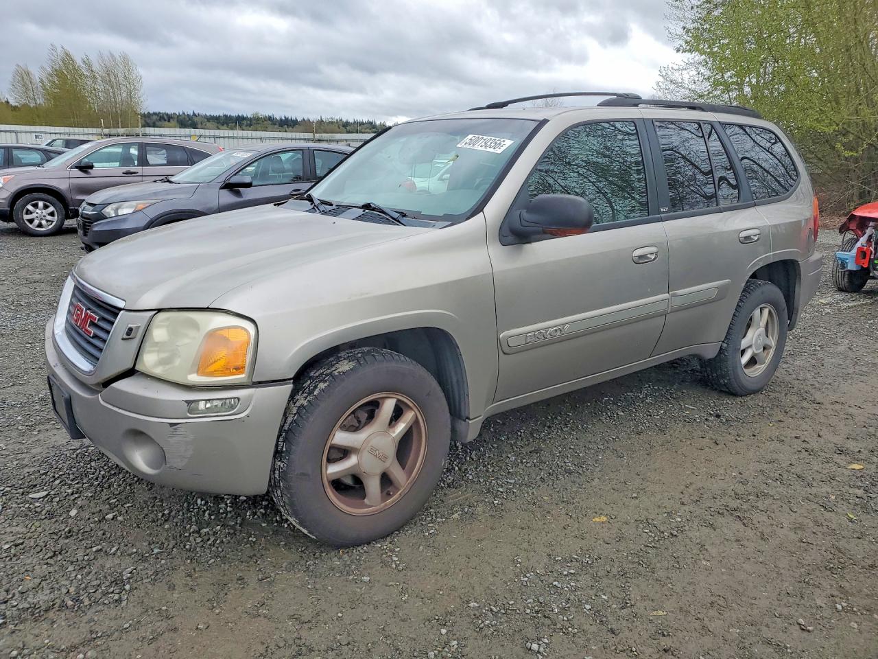 2002 GMC Envoy VIN 1GKDS13S522219773 photo 1