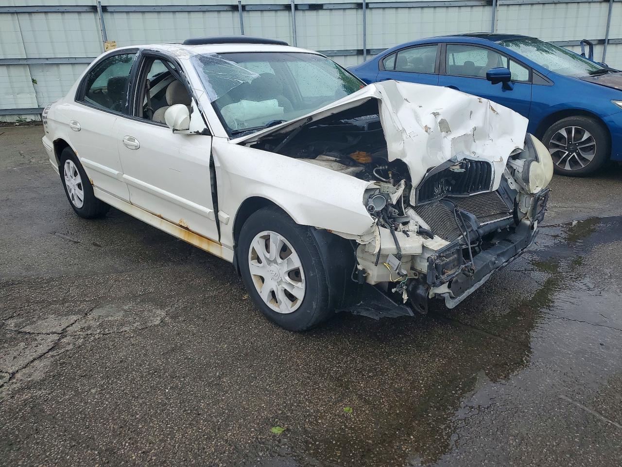 2004 Hyundai Sonata VIN KMHWF25S04A980887 photo 4