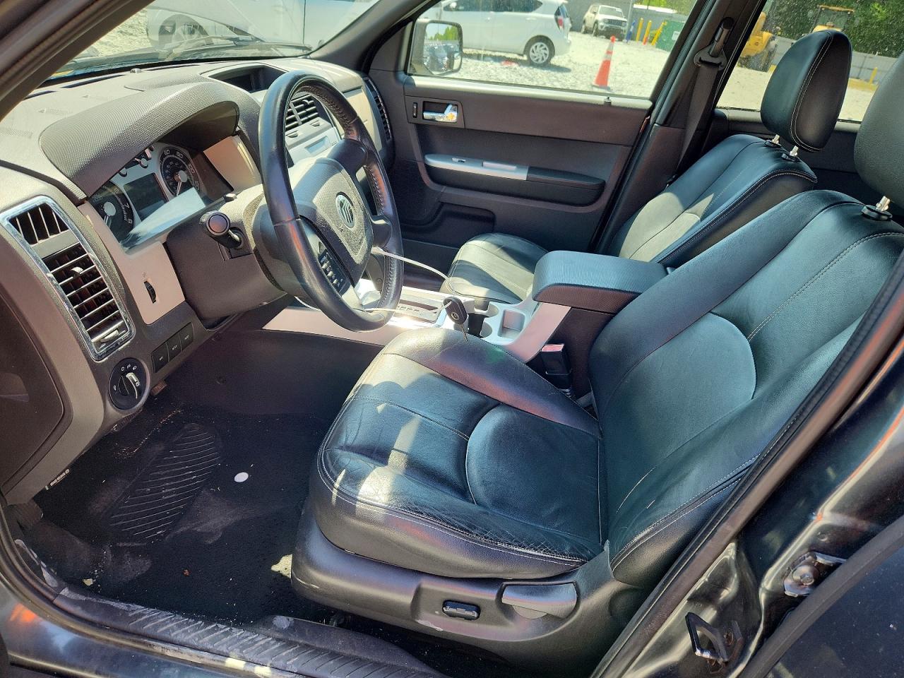 2008 Mercury Mariner VIN 4M2CU91198KJ04199 photo 7