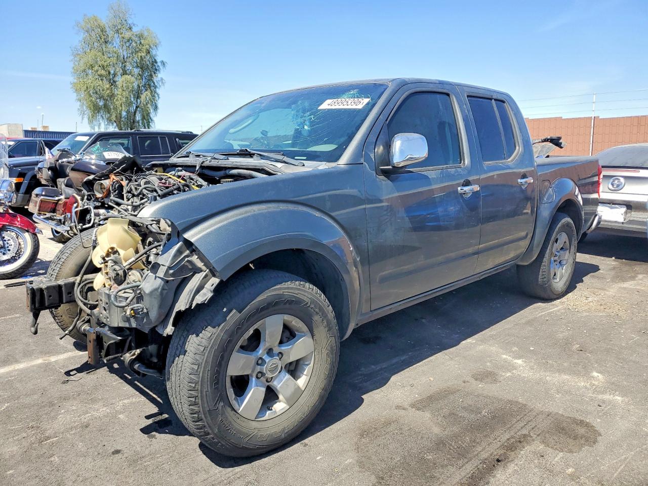 2009 Nissan Frontier VIN 1N6AD07UX9C423789 photo 1