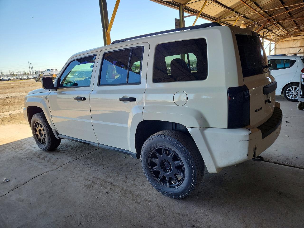 2009 Jeep Patriot VIN 1J4FF28B69D249591 photo 2