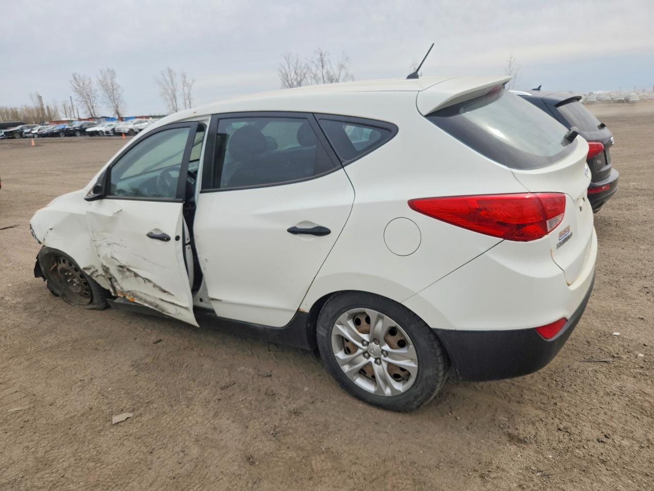 2013 Hyundai Tucson VIN KM8JT3AB1DU602252 photo 2