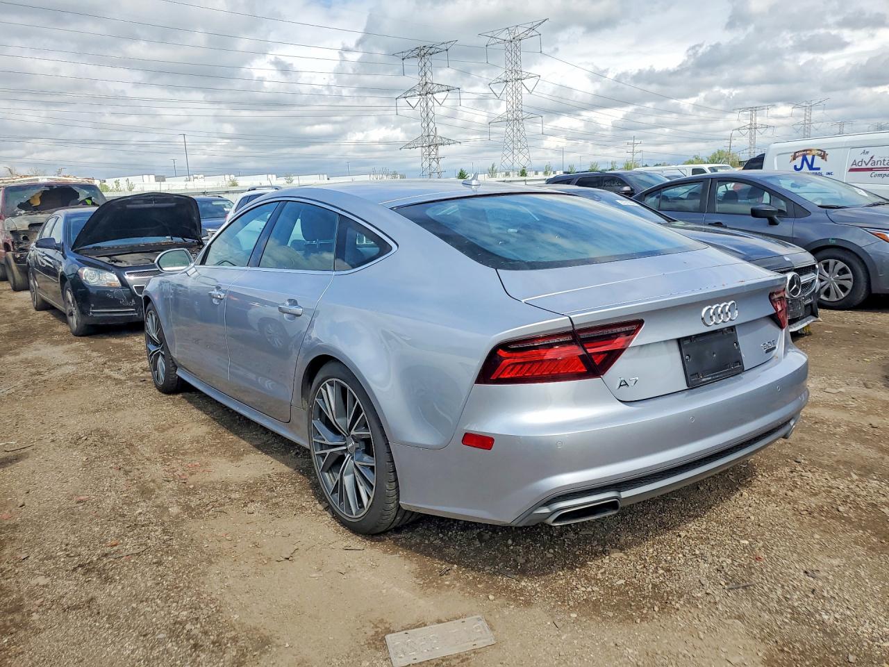 2016 Audi A7 VIN WAU2GAFC1GN132724 photo 2