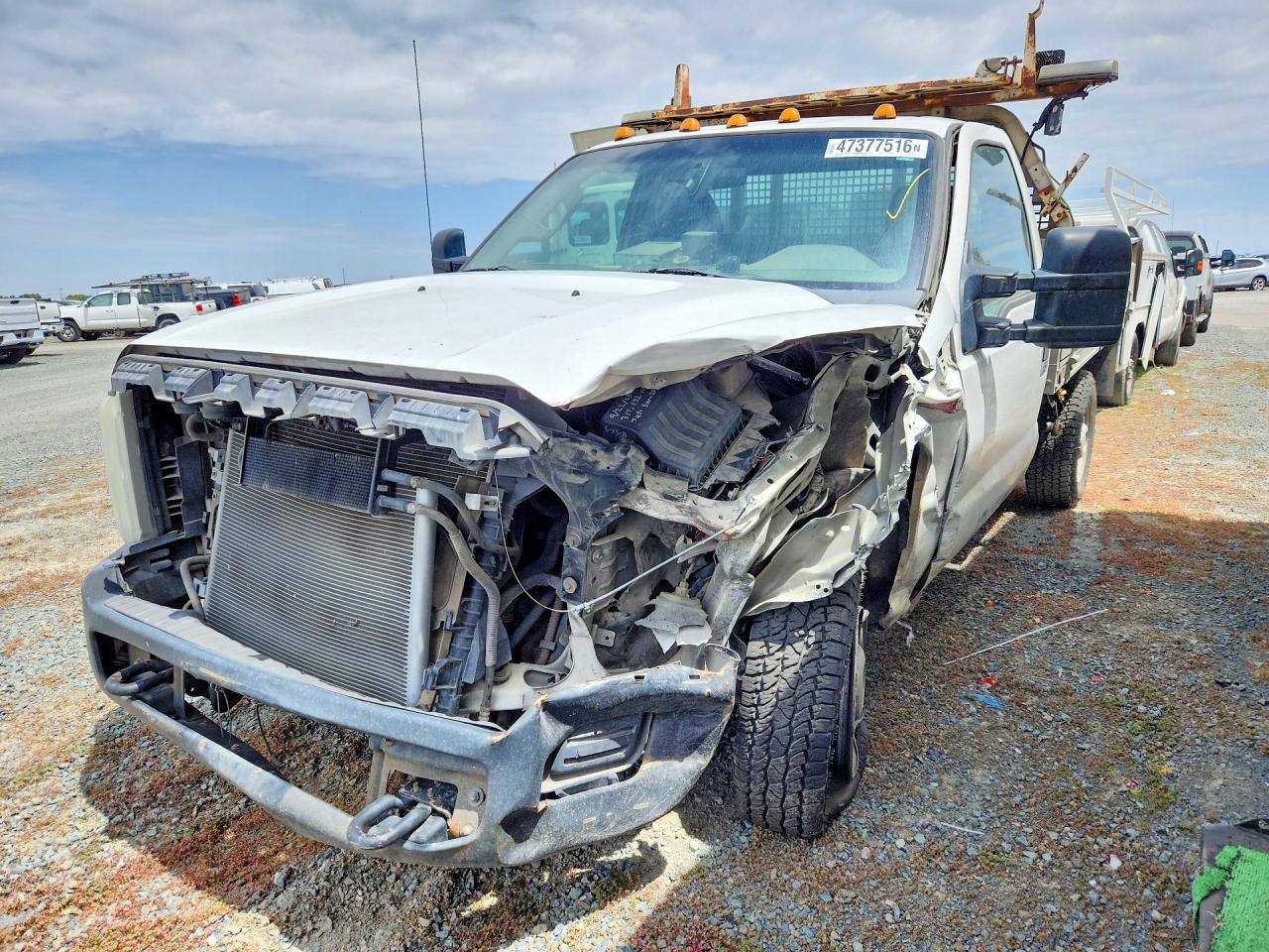 2011 Ford F350 VIN 1FDBF3E69BEB77203 photo 1