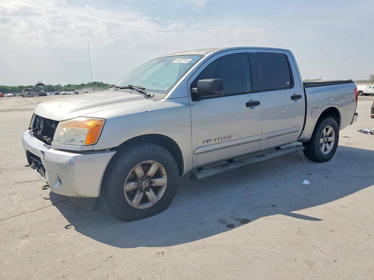 2013 Nissan TITAN VIN 1N6AA0EJ0DN309153 photo 1