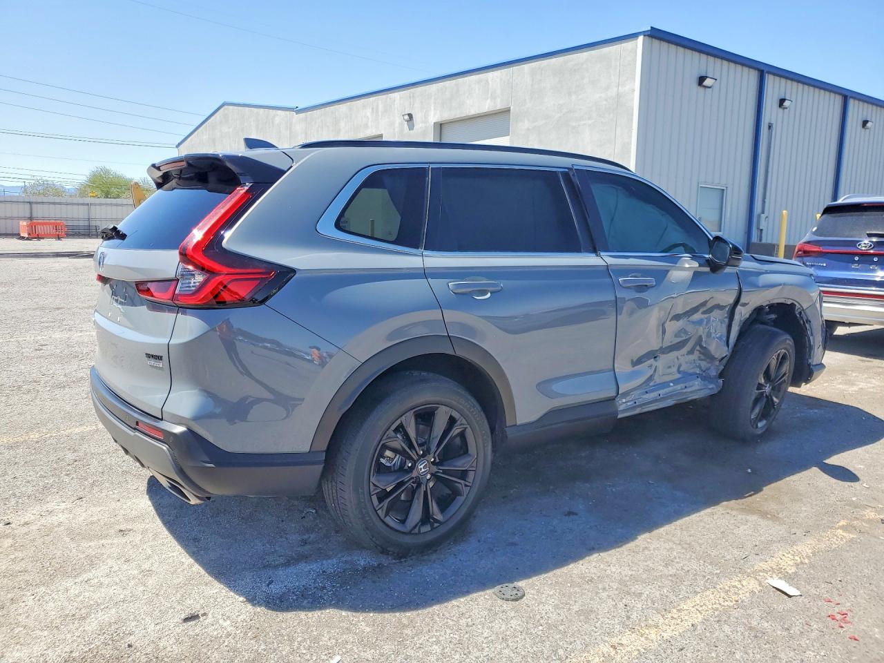 2023 Honda Crv VIN 2HKRS6H90PH810975 photo 3