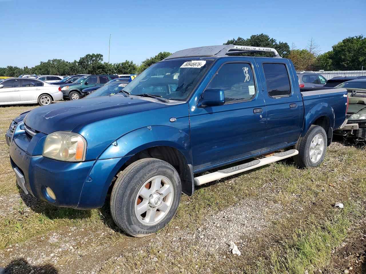 2003 Nissan Frontier VIN 1N6ED27T83C410762 photo 1