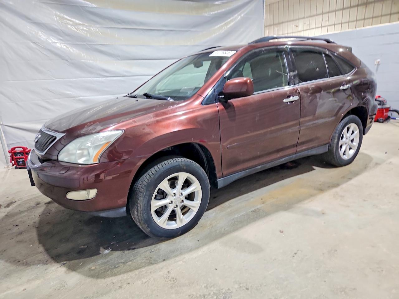 2009 Lexus Rx350 VIN JTJHK31U192855661 photo 1