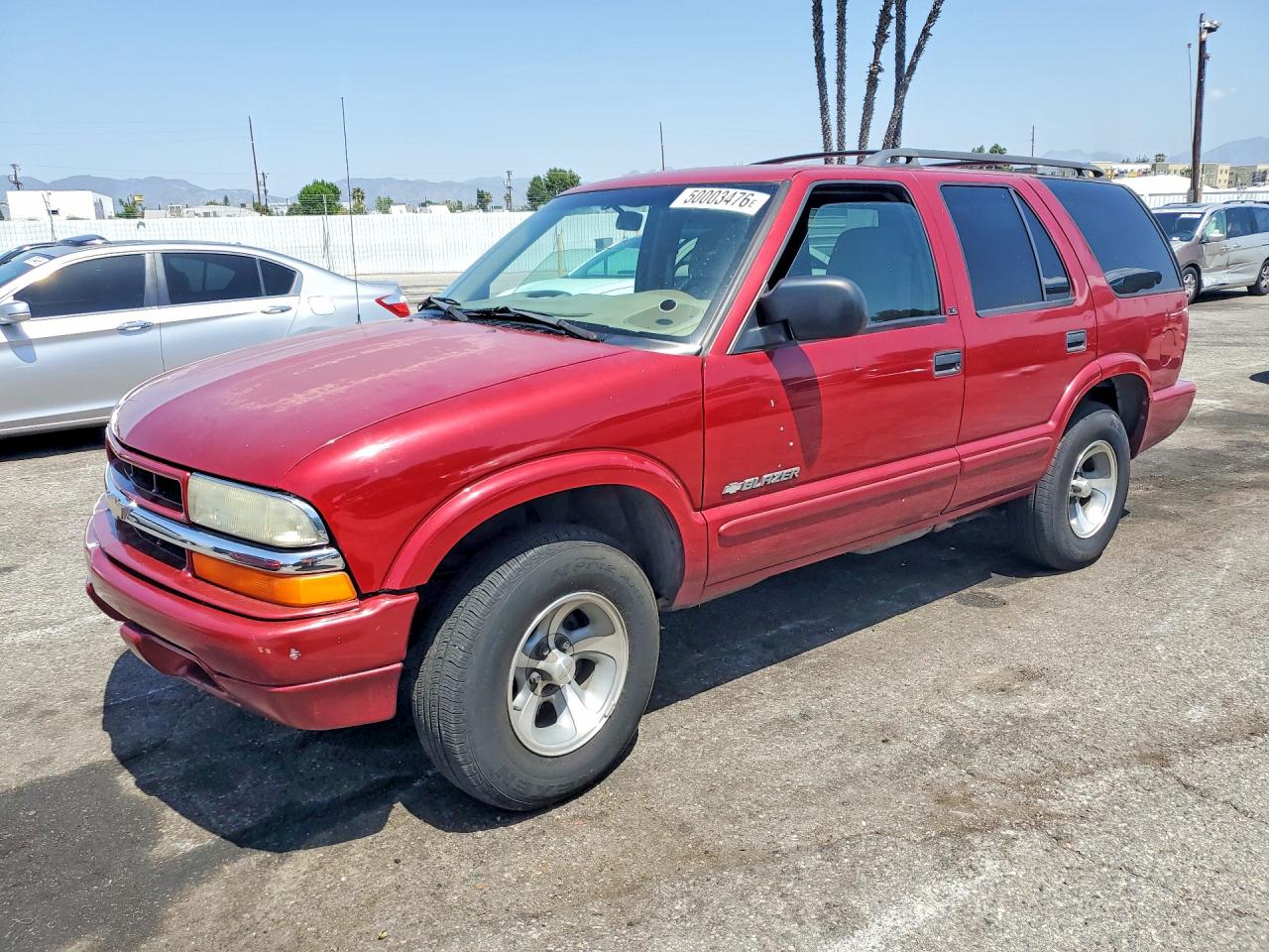 2002 Chevrolet Blazer VIN 1GNCS13W12K114066 photo 1