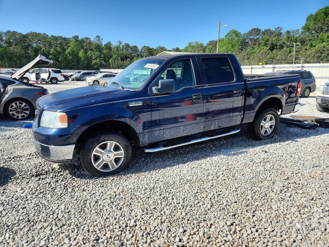 2005 Ford F150 VIN 1FTPW12565KE20644 photo 1