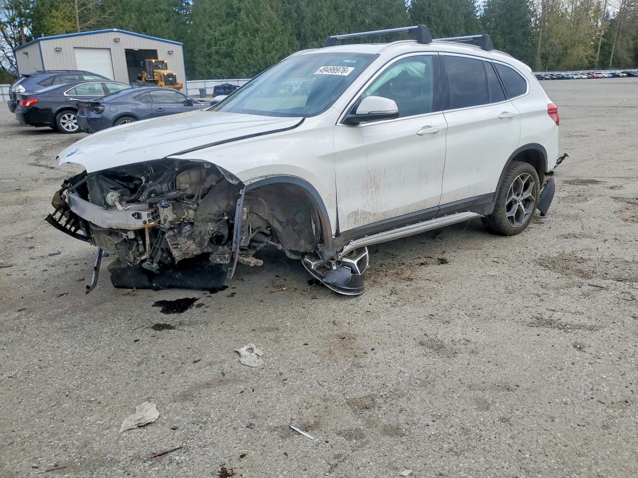 2018 BMW X1 VIN WBXHT3C35J5L28748 photo 1