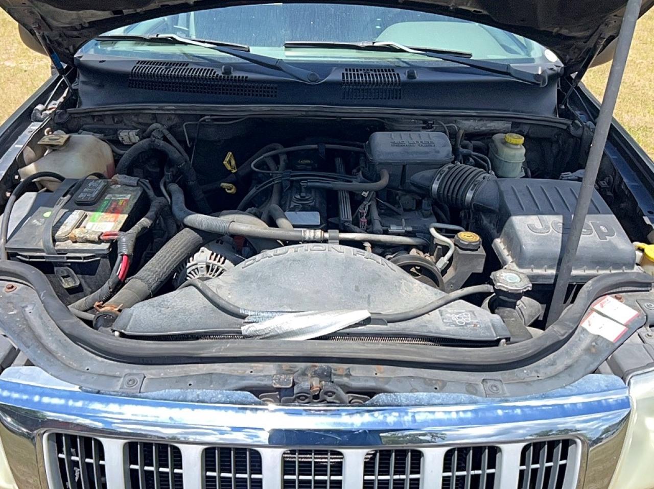 2004 Jeep Cherokee VIN 1J4GW58S14C372462 photo 7