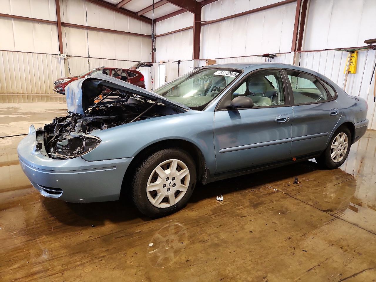 2007 Ford Taurus VIN 1FAFP53U87A164401 photo 1