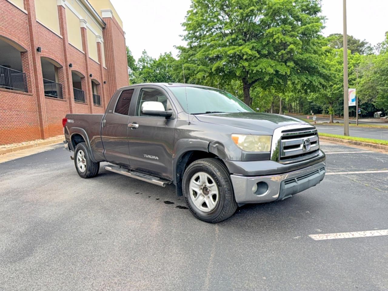 2011 Toyota Tundra VIN 5TFRM5F16BX025150 photo 1