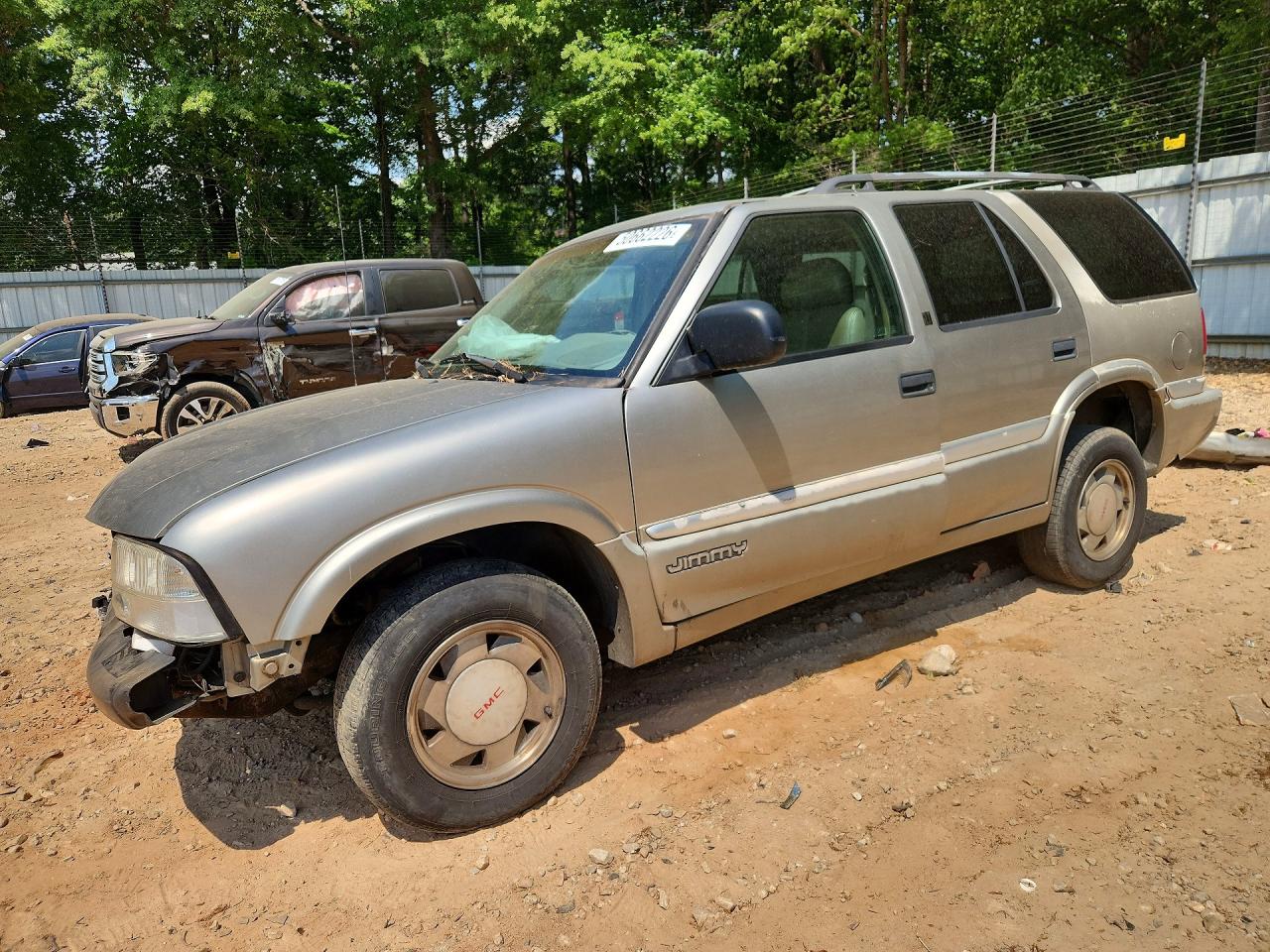 1999 GMC Jimmy VIN 1GKCS13W0X2501969 photo 1