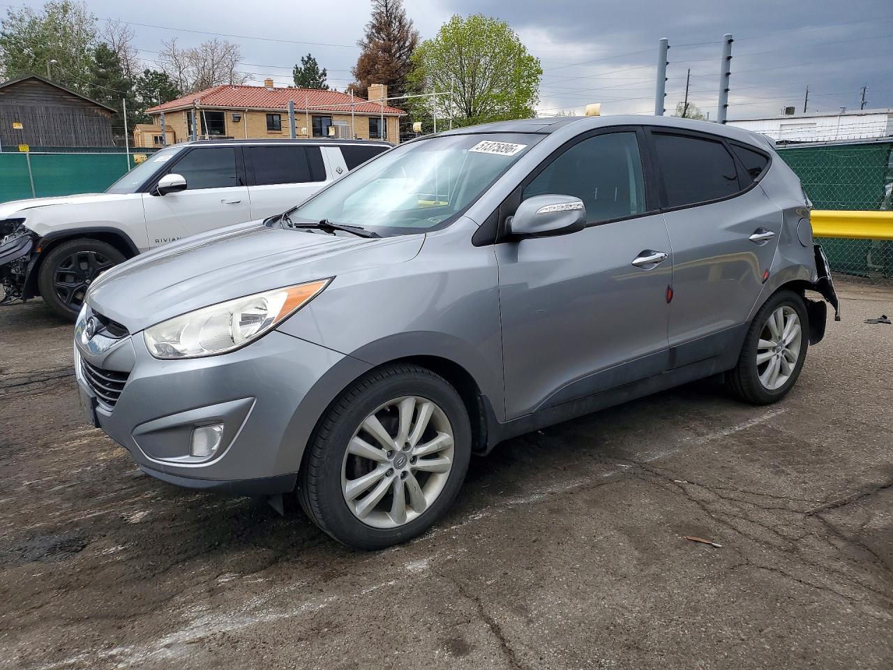 2013 Hyundai Tucson VIN KM8JUCAC6DU690592 photo 1
