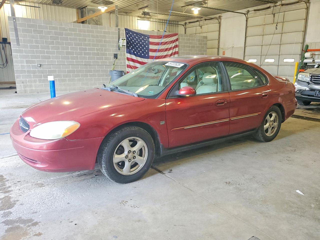 2002 Ford Taurus VIN 1FAHP56S22G282033 photo 1