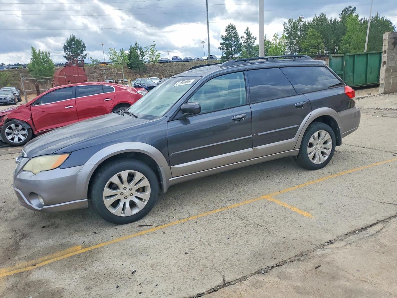 2009 Subaru Outback VIN 4S4BP66C797344658 photo 1