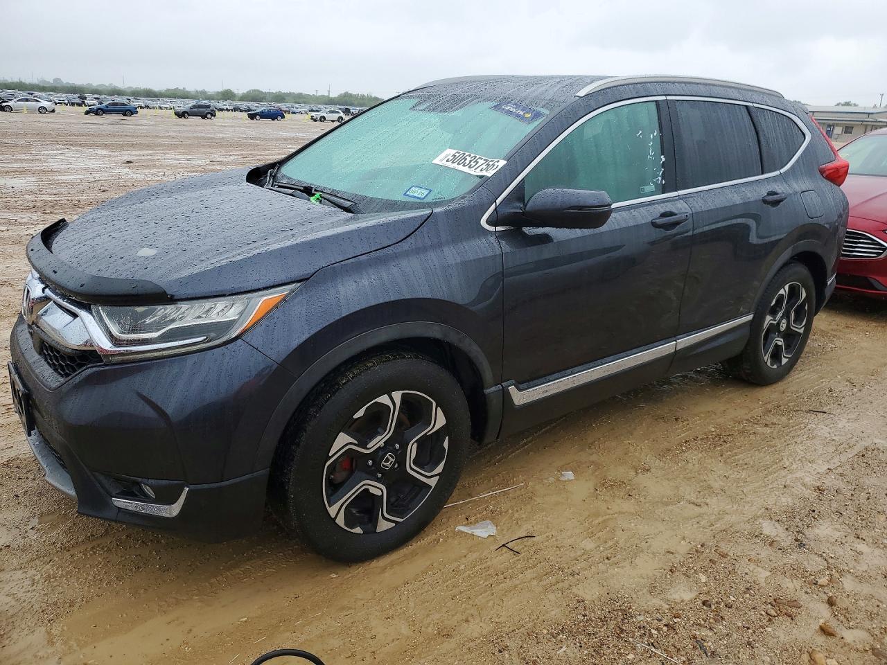 2019 Honda Crv VIN 7FARW1H91KE006879 photo 1