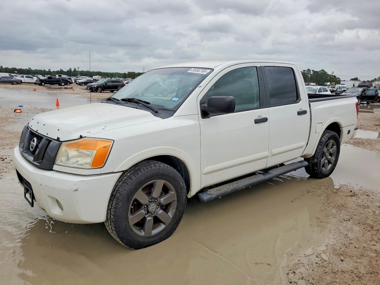2012 Nissan TITAN VIN 1N6BA0EK6CN328253 photo 1