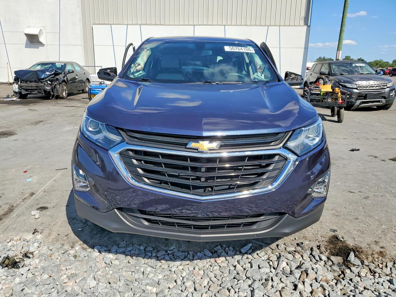 2018 Chevrolet Equinox VIN 3GNAXREV3JS523023 photo 5
