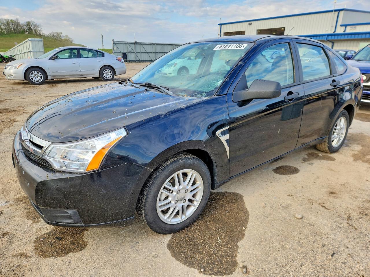 2008 Ford Focus VIN 1FAHP35N88W214138 photo 1