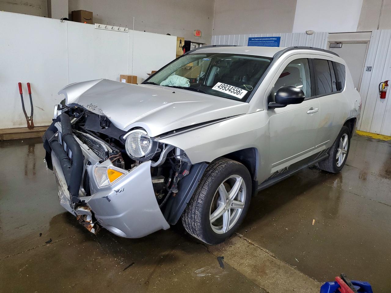 2010 Jeep Compass VIN 1J4NF4FB8AD517913 photo 1